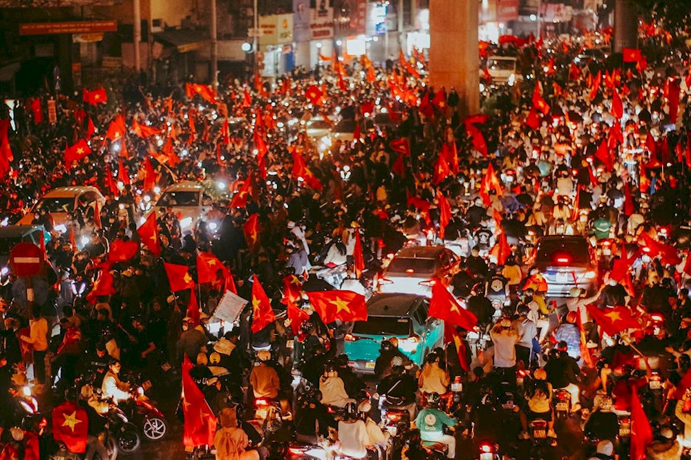 "Di bao" is a one-of-a-kind Vietnamese custom, with motorbikes filling the streets in a festive parade to honor sports victories